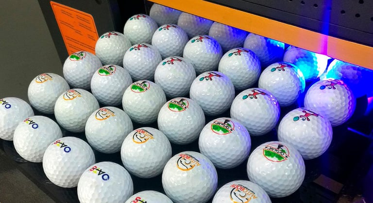 Digital printing on golf balls